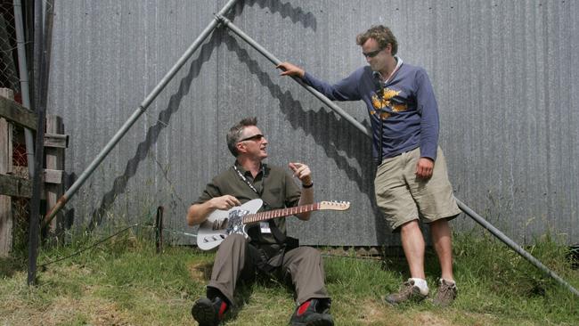 Billy Bragg warms up backstage at the Falls Festival in Lorne with organiser Simon Daleyin 2004. Picture: Brett Hartwig