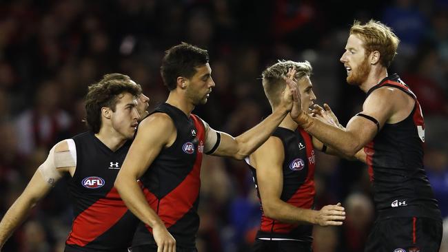 MELBOURNE, AUSTRALIA - MAY 23: Kyle Langford of the Bombers celebrates a goal  during the round 10 AFL match between the Essendon Bombers and the North Melbourne Kangaroos at Marvel Stadium on May 23, 2021 in Melbourne, Australia. (Photo by Darrian Traynor/Getty Images)