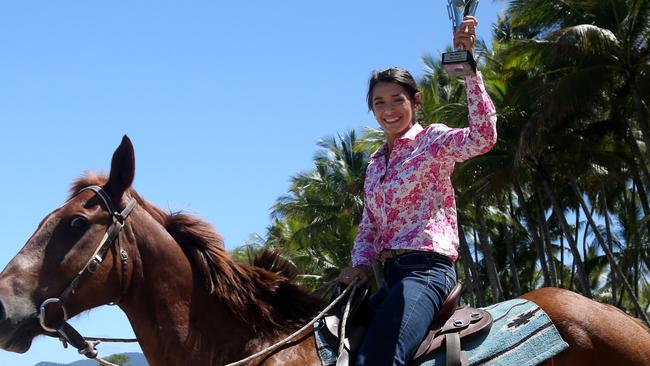 Simone Pringle on Chisholm on Palm Cove beach. PICTURE: STEWART McLEAN