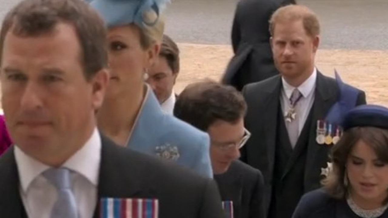 Prince Harry arrives at King Charles coronation.