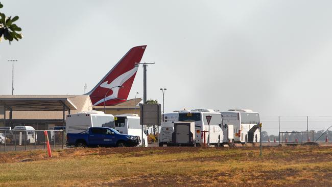 Passengers from Qantas flight QF112 are transported to the Howard Springs quarantine facility on-board waiting buses. The flight from New Delhi is the first repatriation flight for Australians who have been stranded in India following the lifting of the federal government's ban. Picture: Steven Hoare/Getty Images