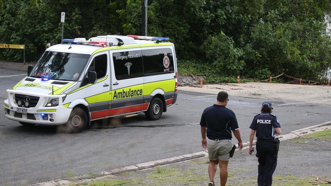 Queensland Ambulance Service and police at the scene. Picture: Stewart McLean