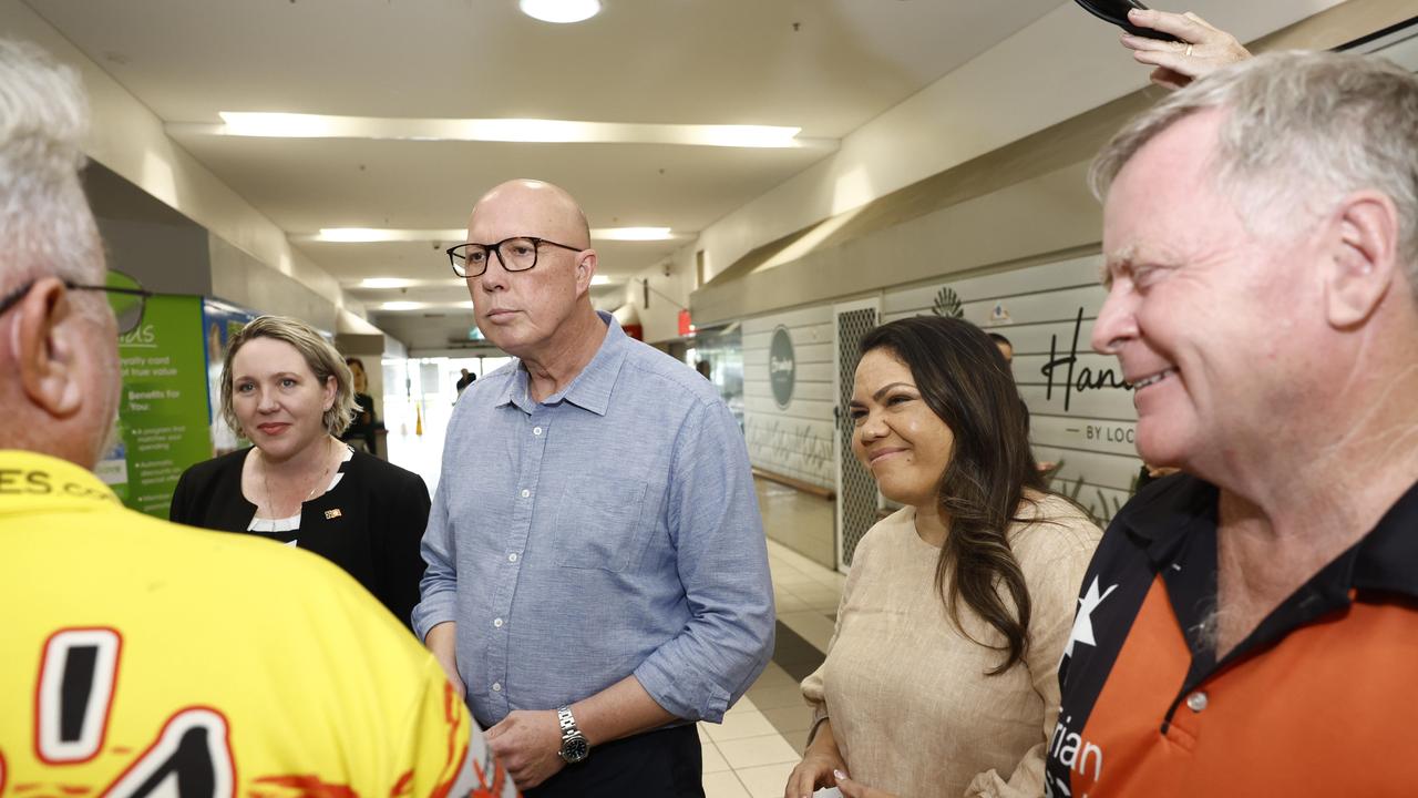 Opposition Leader Peter Dutton and Jacinta Nampijinpa Price talking to locals. Picture: Richard Dobson / Newswire