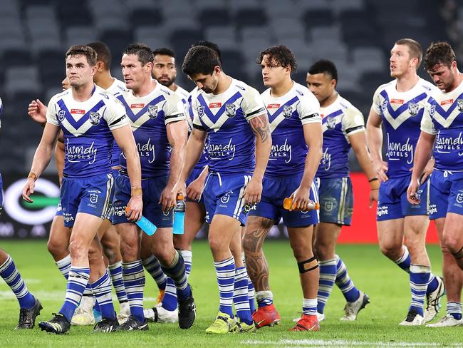 SYDNEY, AUSTRALIA - JULY 03: The Bulldogs look dejected as they leave the field after being defeated 66 - 0 during the round 16 NRL match between the Canterbury Bulldogs and the Manly Sea Eagles at Stadium Australia, on July 03, 2021, in Sydney, Australia. (Photo by Mark Kolbe/Getty Images)