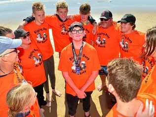 HAVE HIS BACK: The annual Island Charity Swim saw Daley Cuthel's support crew rally behind him. Picture: John McCutcheon