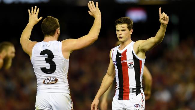 Jack Sinclair of the Saints is congratulated by Jack Steven of the Saints after he kicks a goal during the round 6 AFL match between the Melbourne Demons and the St Kilda Saints at Etihad Stadium in Melbourne, Saturday, April 30, 2016. (AAP Image/Tracey Nearmy) NO ARCHIVING, EDITORIAL USE ONLY