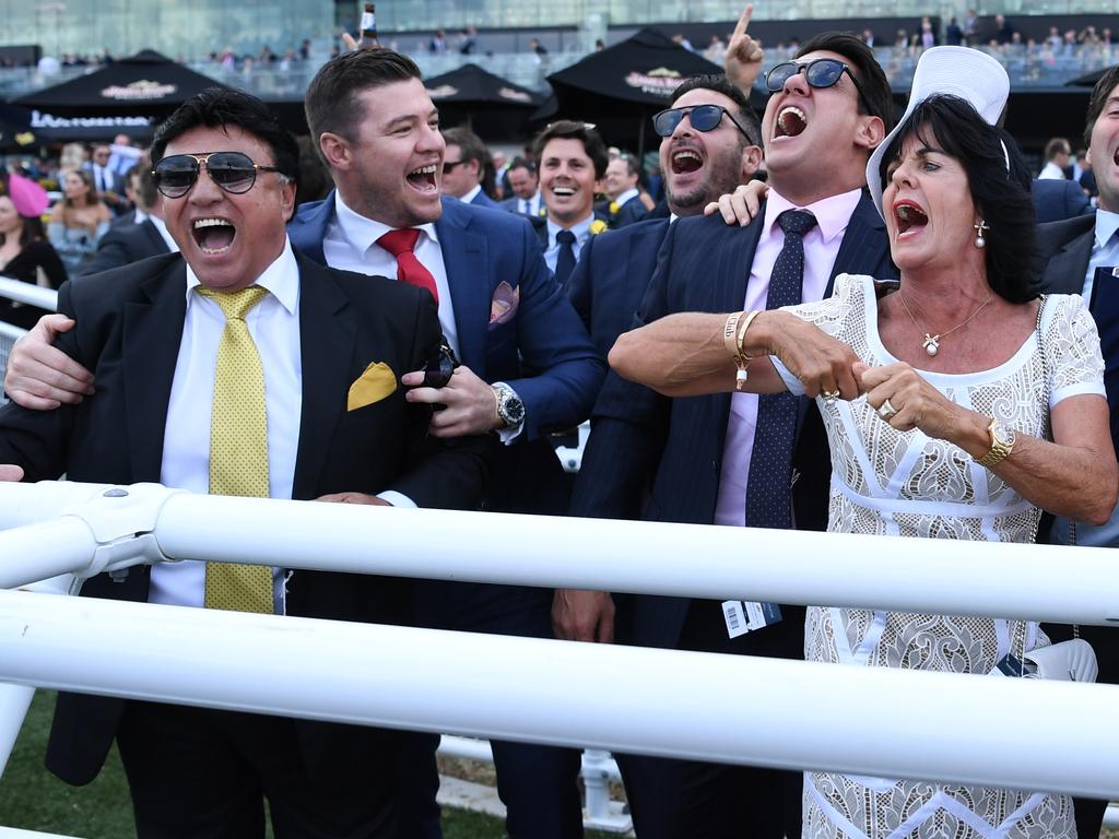 Racing mogul Bert Vieira (left) with wife Gai (right) at the track in April 2018. Picture; AAP Image/David Moir