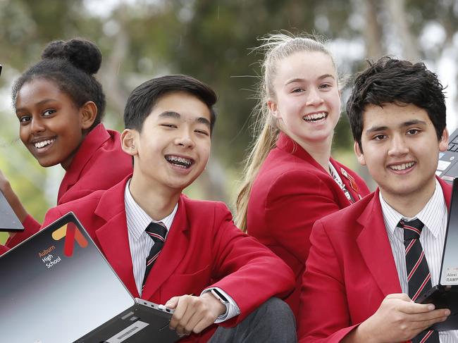 School Hub Chapter 3 showing a five year analysis of schools' NAPLAN scores. Auburn High School year 9 students Yomiyu 14, Thomas 15, Amy 15 and Alexi 15 who did their NAPLAN test online, celebrate their results.     Picture: David Caird