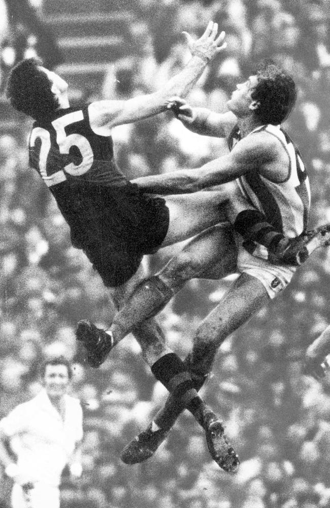 Simon Madden and Gary Dempsey do battle in the ruck.