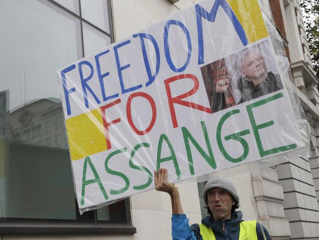 A supporter of Wikileaks founder Julian Assange demonstrates outside Westminster Magistrates' Court in London. Picture: AP Photo/Kirsty Wigglesworth