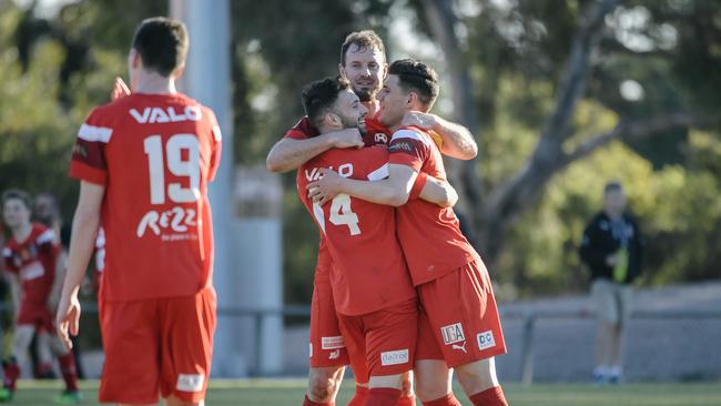 Campbelltown City players celebrate their win against Sydney Olympic Football Club. Picture: AAP Image/Morgan Sette