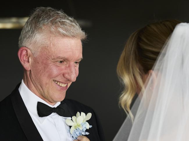 ProfessorMcArthur with his daughter, Sarah, on her wedding day in March. Picture: Supplied