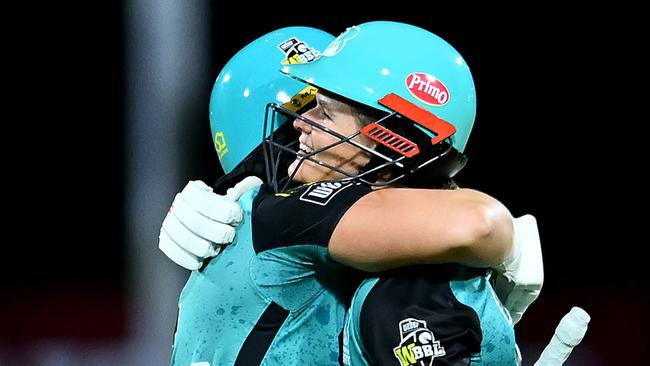 BRISBANE, AUSTRALIA - NOVEMBER 24: Laura Harris and Jessica Jonassen of the Heat celebrate victory during the WBBL match between Brisbane Heat and Sydney Sixers at Allan Border Field on November 24, 2024, in Brisbane, Australia. (Photo by Albert Perez/Getty Images)