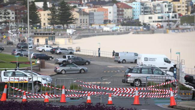 Signs and tape barring cars from entering the Bondi Beach carpark the day it was closed. Picture: Damian Shaw