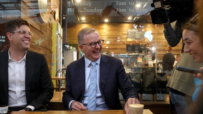 Anthony Albanese has a coffee with Labor candidate for Bennelong, Jerome Laxale, and constituents at a Sydney cafe hours before he tested positive for Covid. Picture: Toby Zerna