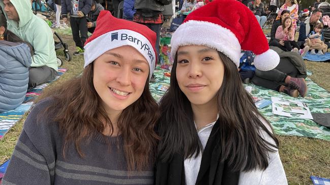 Doncaster East's Carly Senior and Megan Yii hang out at Manningham's 2022 Carols.