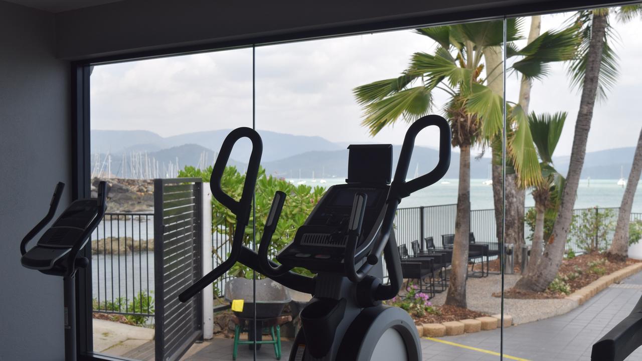 The fitness room with panoramic views over the Coral Sea.