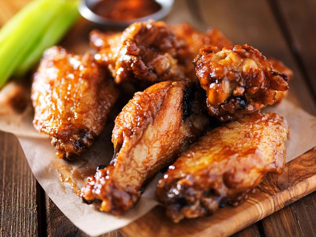 After a couple of hours, shake off the excess marinade and grill or barbecue the chicken wings slowly.