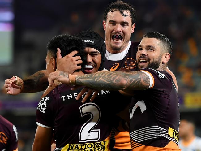 BRISBANE, AUSTRALIA - AUGUST 11: Brisbane Broncos celebrate a try that was later disallowed during the round 24 NRL match between the Brisbane Broncos and Parramatta Eels at The Gabba on August 11, 2023 in Brisbane, Australia. (Photo by Albert Perez/Getty Images)