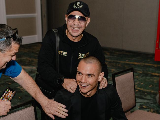 Kostya Tszyu embraces son Tim in an emotional family reunion, Orlando. Picture: Johnny Garcia