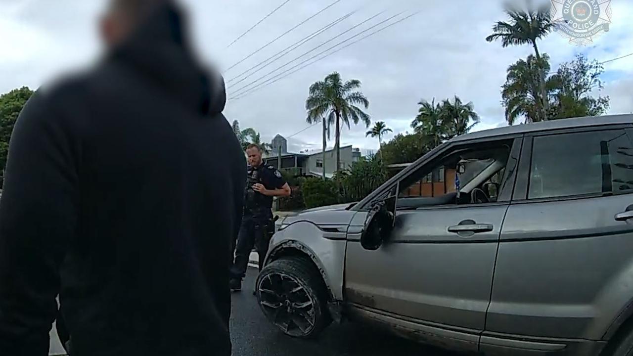 The car was badly damaged when police found it stopped in Savoy St. Picture: QPS