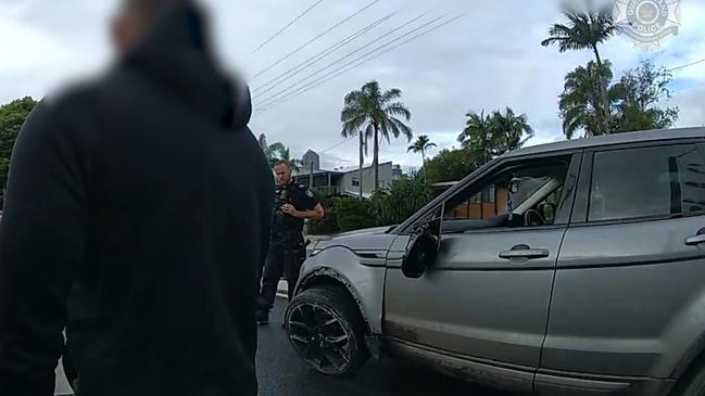 The car was badly damaged when police found it stopped in Savoy St. Picture: QPS