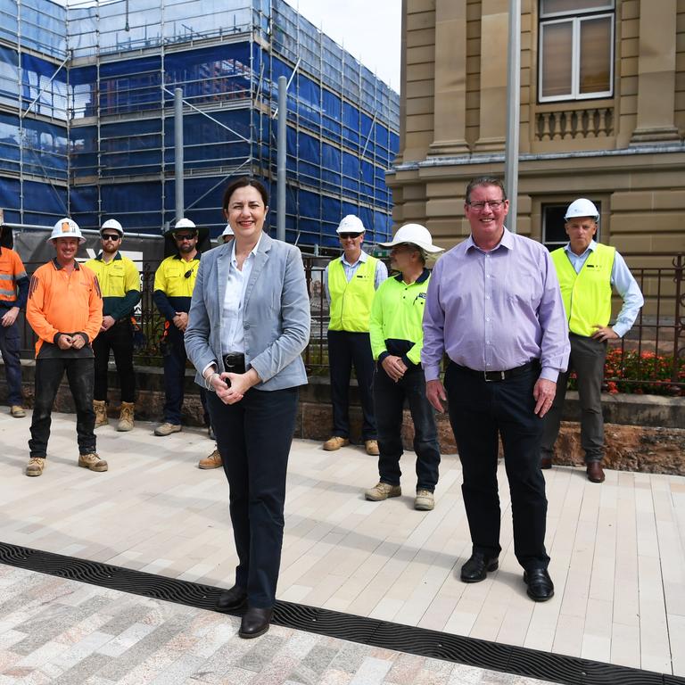 Premier of Queensland Annastacia Palaszczuk and member for Rockhampton Barry O'Rourke with workers at the new art gallery.