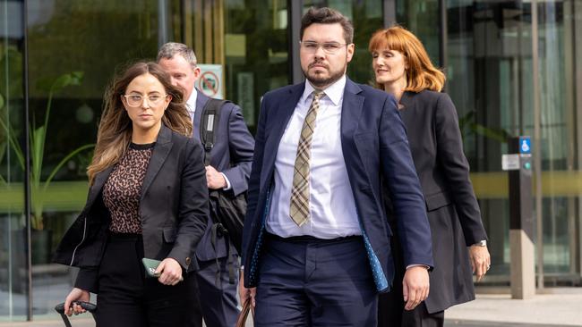Accused rapist Bruce Lehrmann, front right, leaves the ACT Supreme Court after the judge’s summing up on Wednesday with his solicitor Rachel Fisher, left, and lawyer Katrina Musgrove. Picture: Ben Appleton