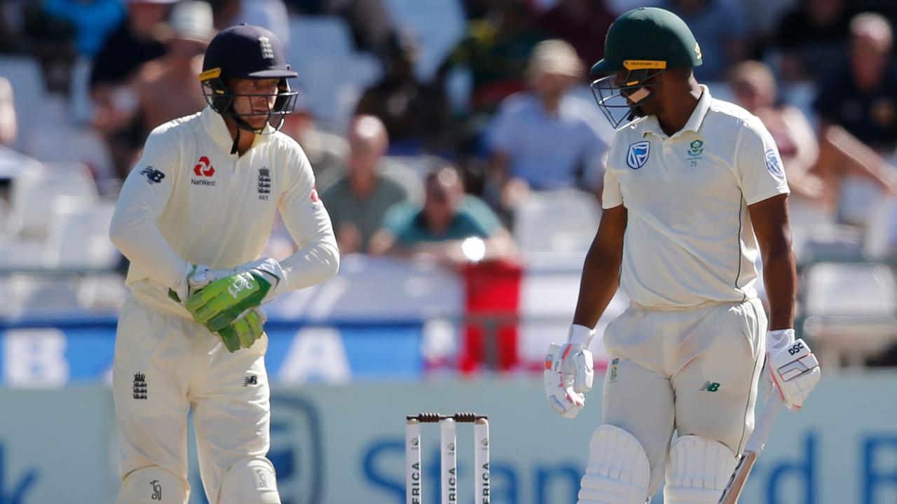 Vernon Philander stares at England's Jos Buttler, who was fined for his comments directed at the South African star.