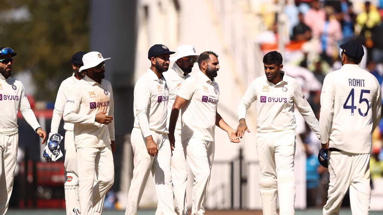 The Indian players celebrate their win after Scott Boland was the last man out.