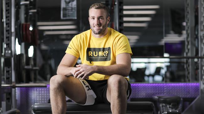 Wallabies lock Izack Rodda visited Anytime Fitness at Bowen Hills to back the Tread As One treadmill challenge to support the suicide prevention message of the charity RU OK? Picture: Mark Cranitch