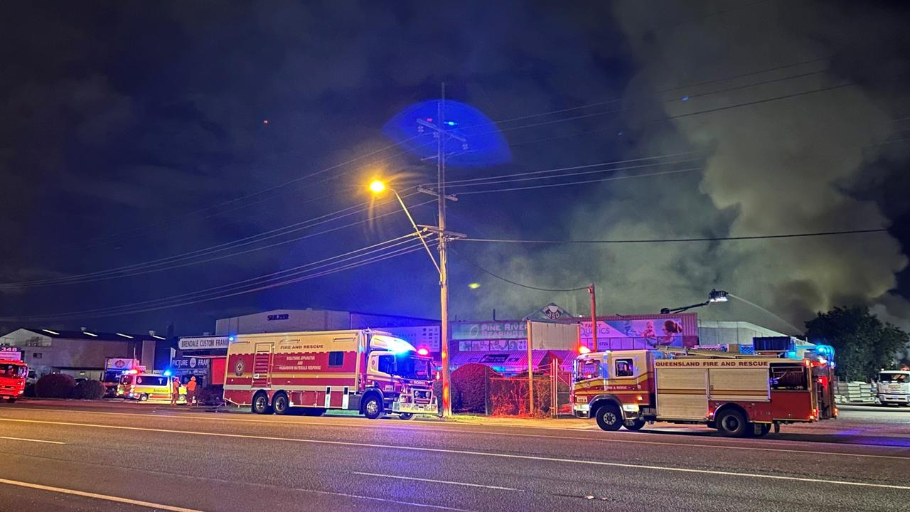 Crews at the scene of the industrial shed fire at Brendale. Picture: QFES