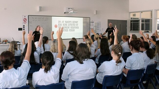 Teachers Anna Wyatt and Paul Bullpitt with Year 11 girls students as part of PBC's Growing Good Humans program.