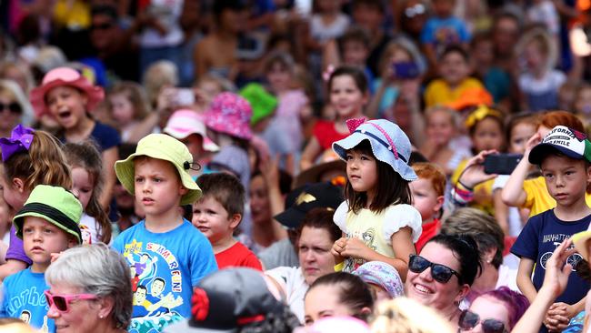 Kids join a huge crowd watching the Wiggles as Dreamworld is packed at the start of the school holidays. Pics Adam Head