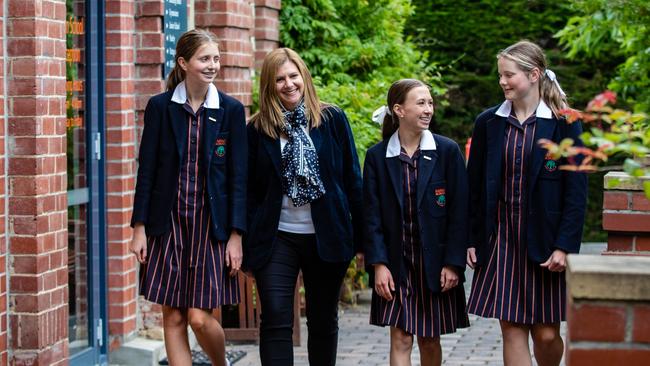 Fahan Year 9 students; Hannah Sheen, Ava McGlone, and Matilda Cocker with Principal Meg Lawson. Picture: Linda Higginson