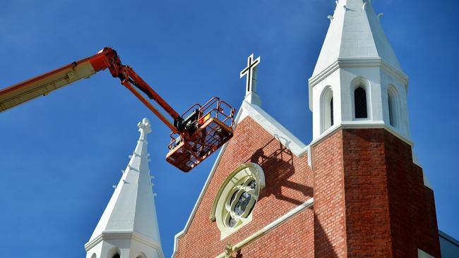 Sacred Heart Cathedral gets lick of paint during routine maintenance.