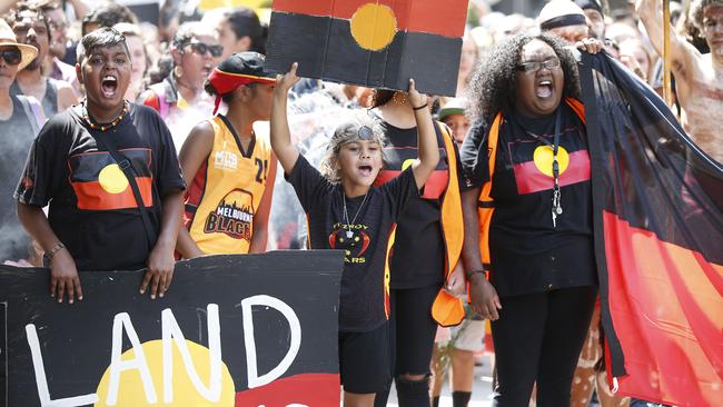 An Invasion Day rally from Parliament to Flinders Street Station last year. Picture: David Caird