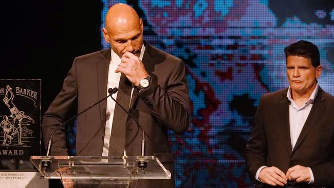 Former St. Kilda stars Stewart Loewe (left) and Robert Harvey pay tribute to their great mate, Danny Frawley. Pic: AAP