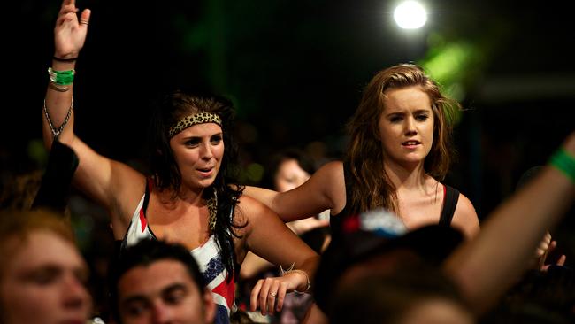 Punters get up above the crowd for a better view. Bassinthegrass 2011 at the Darwin Amphitheatre.