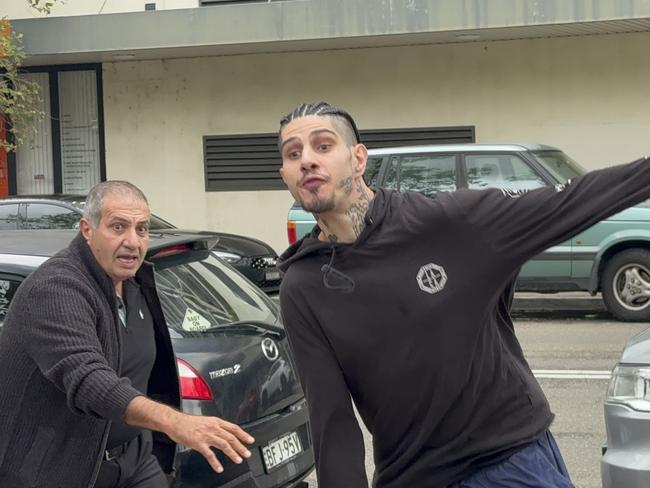 Issa Haddad (right) outside Fairfield Local Court on May 8.