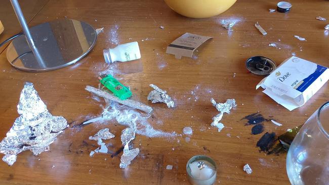 A candle and traces of white powder on a table of the hotel room where Liam Payne was staying in Buenos Aires. Picture: Buenos Aires Police