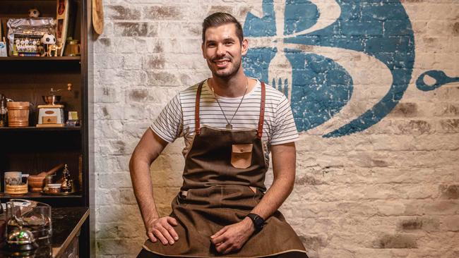 Almir Dizdaric, the manager of Bondeno Cafe in Fairfield, at his cafe on Friday. Picture: Flavio Brancaleone