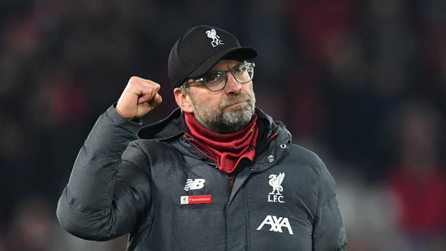 Liverpool's German manager Jurgen Klopp gestures at the end of the English Premier League football match between Liverpool and Wolverhampton Wanderers at Anfield in Liverpool, north west England, on December 29, 2019. (Photo by Paul ELLIS / AFP) / RESTRICTED TO EDITORIAL USE. No use with unauthorized audio, video, data, fixture lists, club/league logos or 'live' services. Online in-match use limited to 120 images. An additional 40 images may be used in extra time. No video emulation. Social media in-match use limited to 120 images. An additional 40 images may be used in extra time. No use in betting publications, games or single club/league/player publications. /