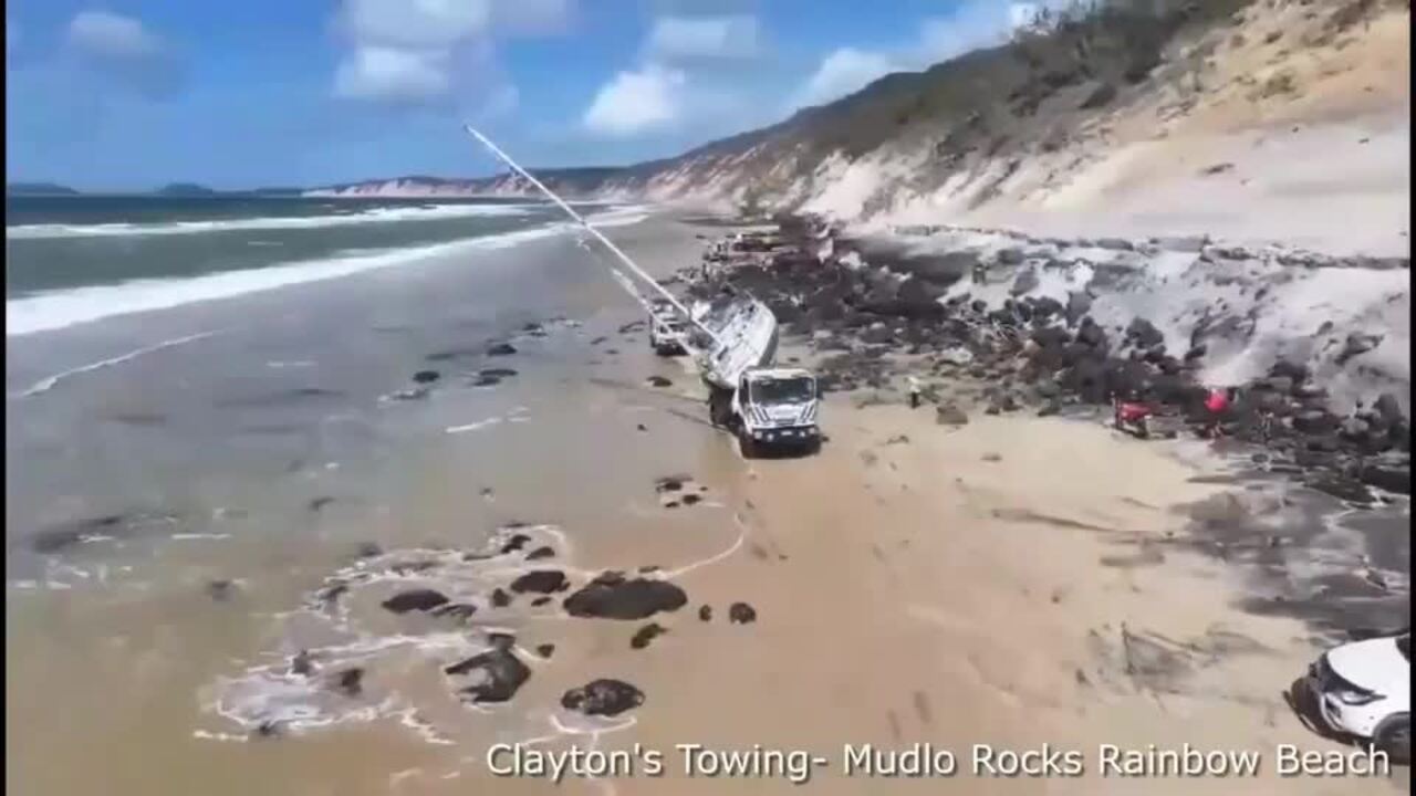 Clayton's Towing share footage of Rainbow Beach yacht rescue