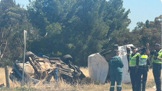 A mangled wreck is all that remains of a car and school bus after they collided near Two Wells. Picture: Jase Kemp 10NEWS