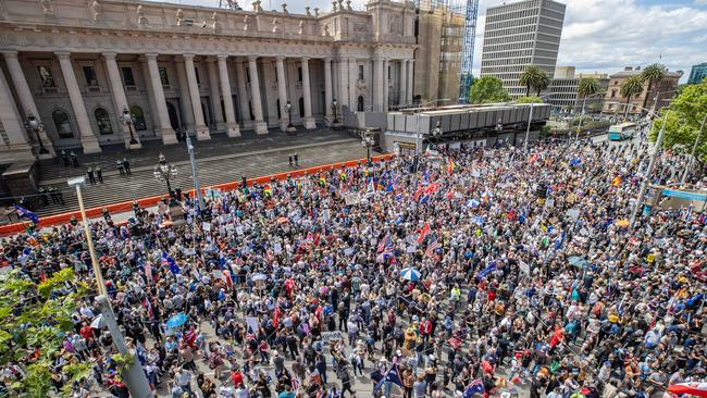 Many gathered at the Victorian Parliament to protest Covid vaccine mandates. Picture: Jason Edwards