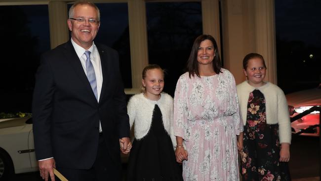 Scott Morrison and his family arriving at Government House, Canberra. Photo: Kym Smith