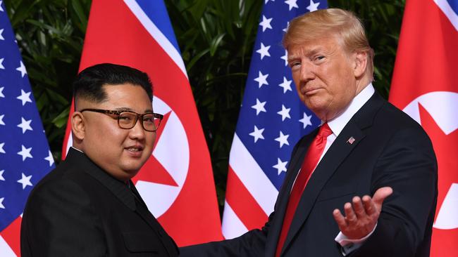 Then US president Donald Trump meets with North Korea's leader Kim Jong Un at the start of their historic US-North Korea summit in June 2018. Picture: AFP