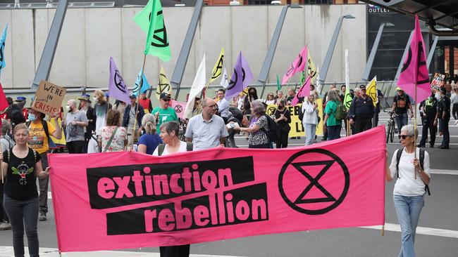 Extinction Rebellion Victoria hold a protest outside Southern Cross Station in Melbourne. Picture: David Crosling