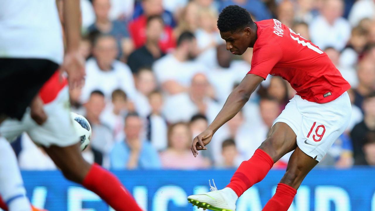 Marcus Rashford of England scores his sides first goal.